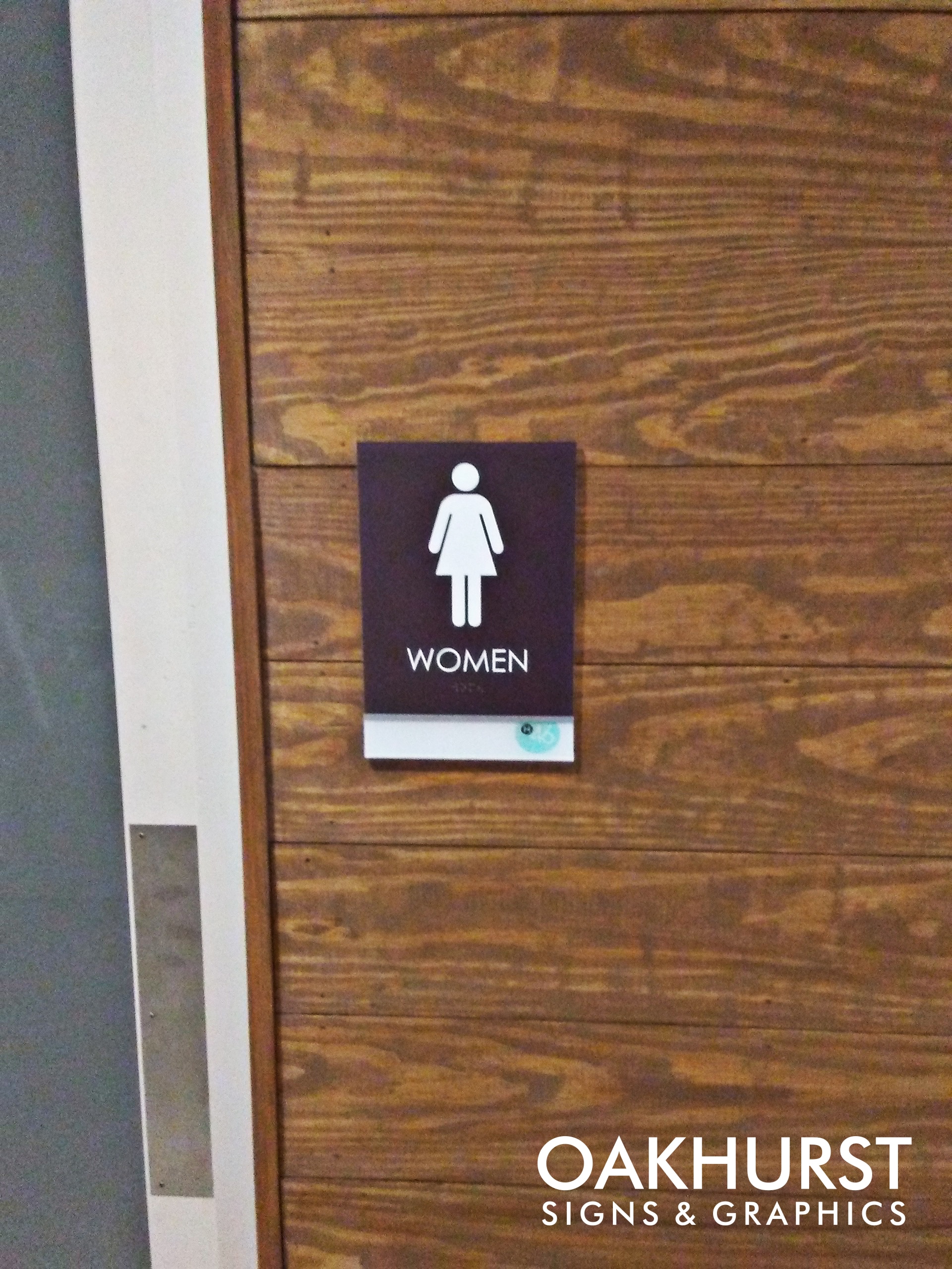 ADA signage labeling women's room