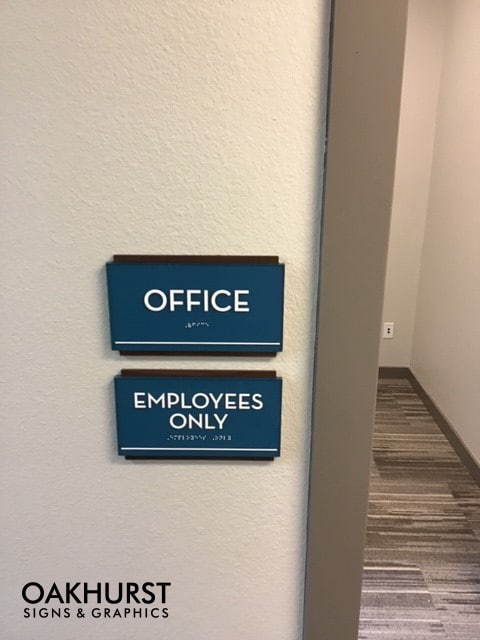 ADA room labeling signage reading "office", and "employees only"