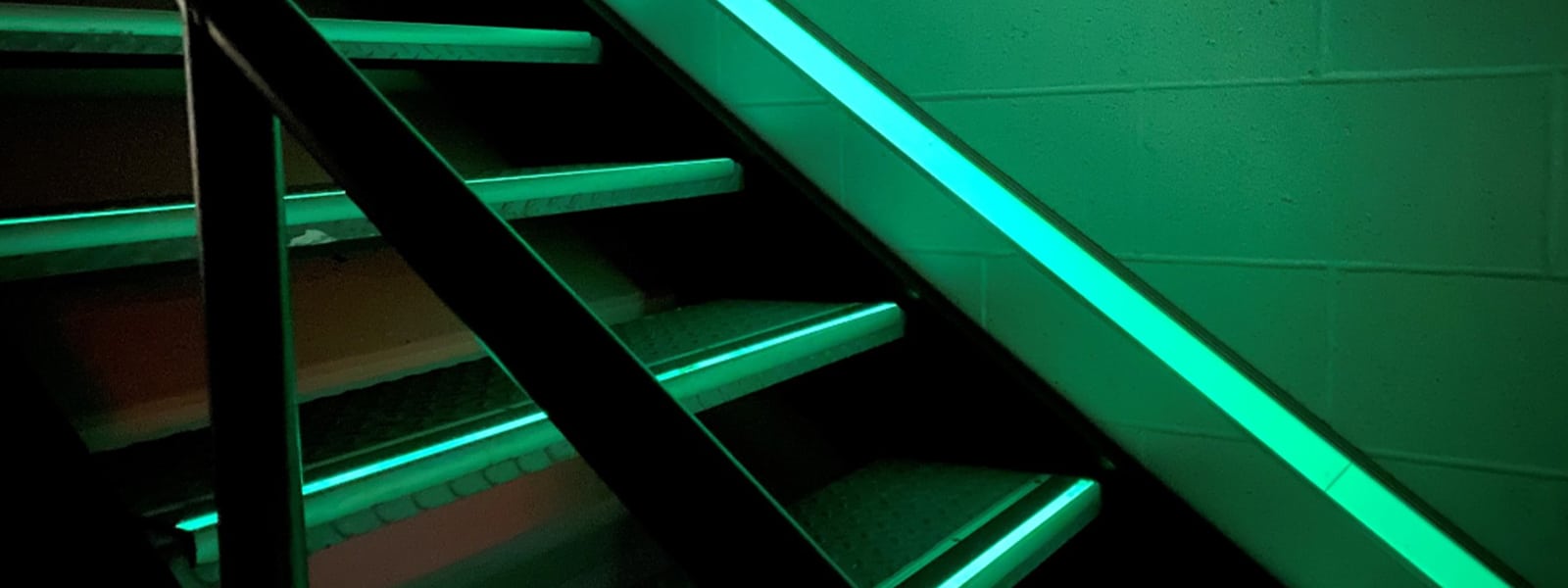 Photoluminescent lighting in a stairwell 